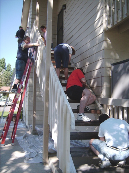 Volunteers paint an apartment complex for the Boulder County Housing Authority as part of the Boulder Colorado Stake’s Colorado Cares Day project on May 12, 2007. 