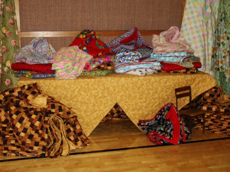 The Boulder Colorado Stake Relief Society made 215 quilts from mid-July through mid-September. On Sept. 27, 2008, they packed them into boxes bound for the LDS Humanitarian Center in Salt Lake City to be used by disaster victims.