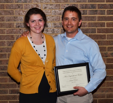 Monarch High School teacher David Evans, right, received the “Most Inspirational Teacher” award from the Boulder Colorado Stake of The Church of Jesus Christ of Latter-day Saints on April 16, 2014, in its teacher awards night. KezLee Ferrera, left, nominated Evans.